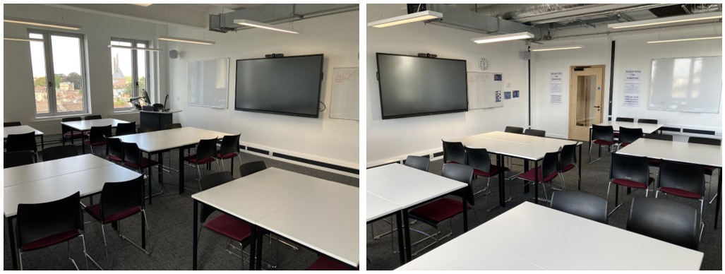 Classroom with groups of tables and chairs.